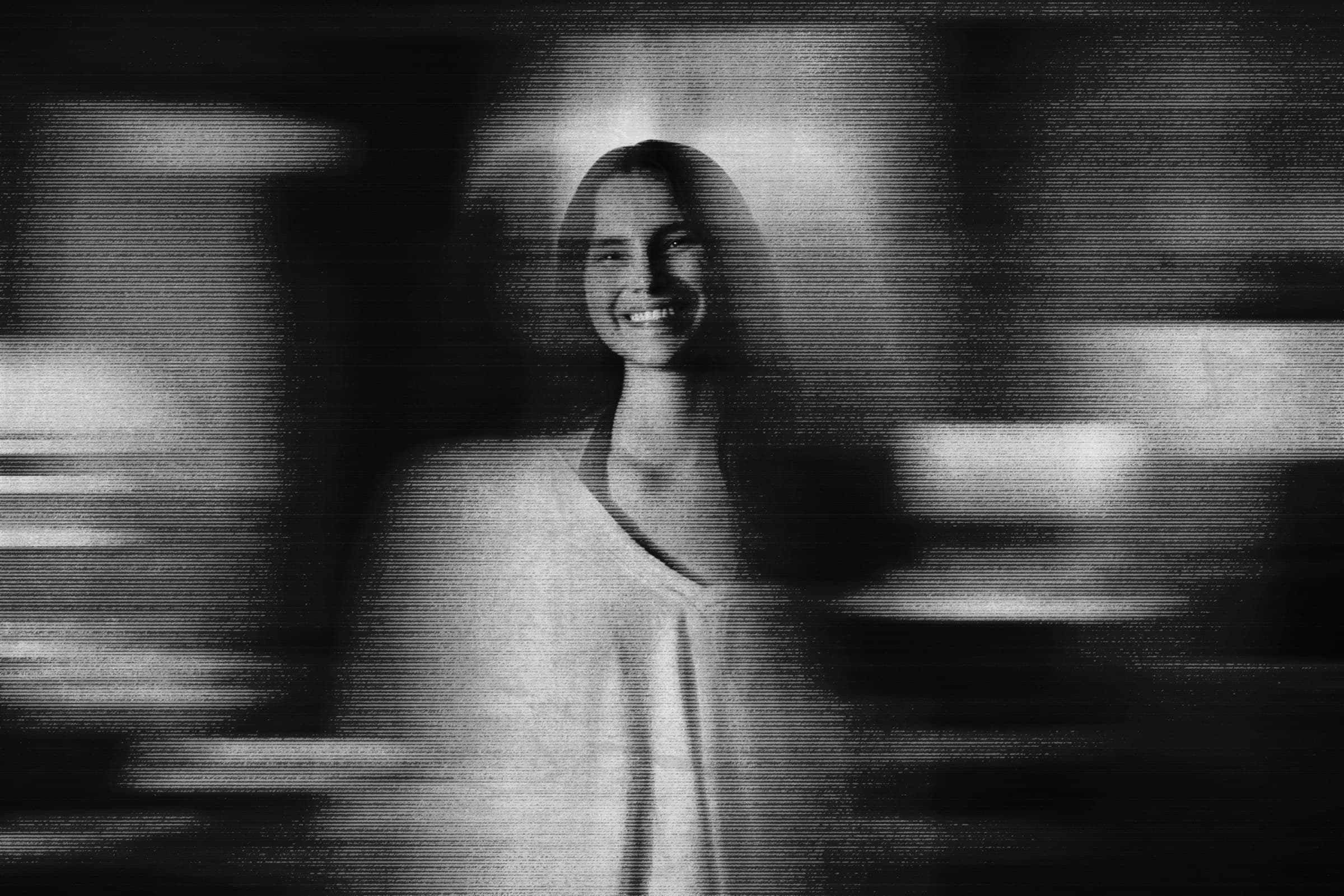 Nikki Freeman smiling, rendered with a strong scanline/halftone glitch texture.